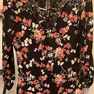 V Neck crochet lace back shirt.